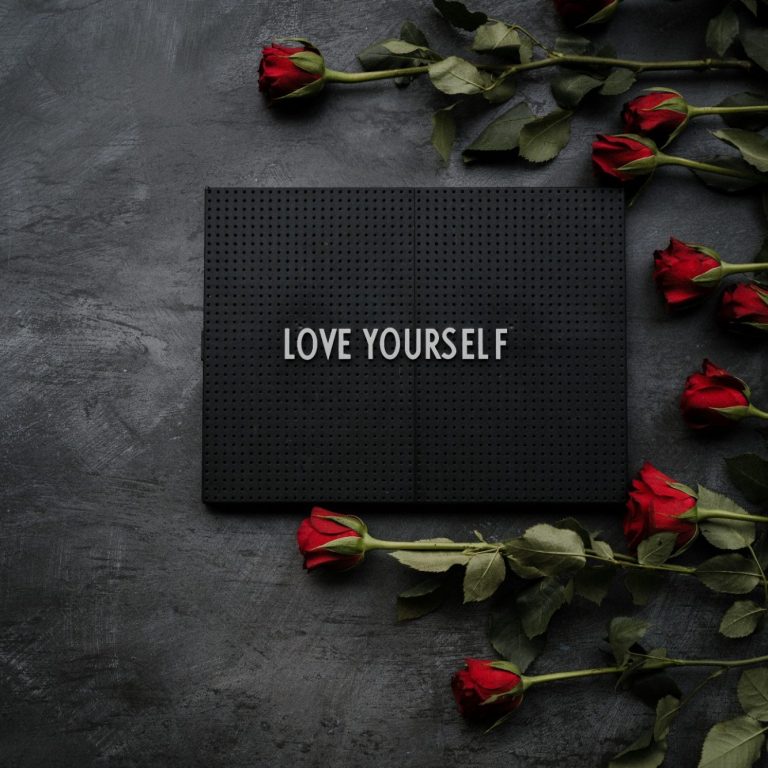 Love Yourself logo Picture of love yourself with roses